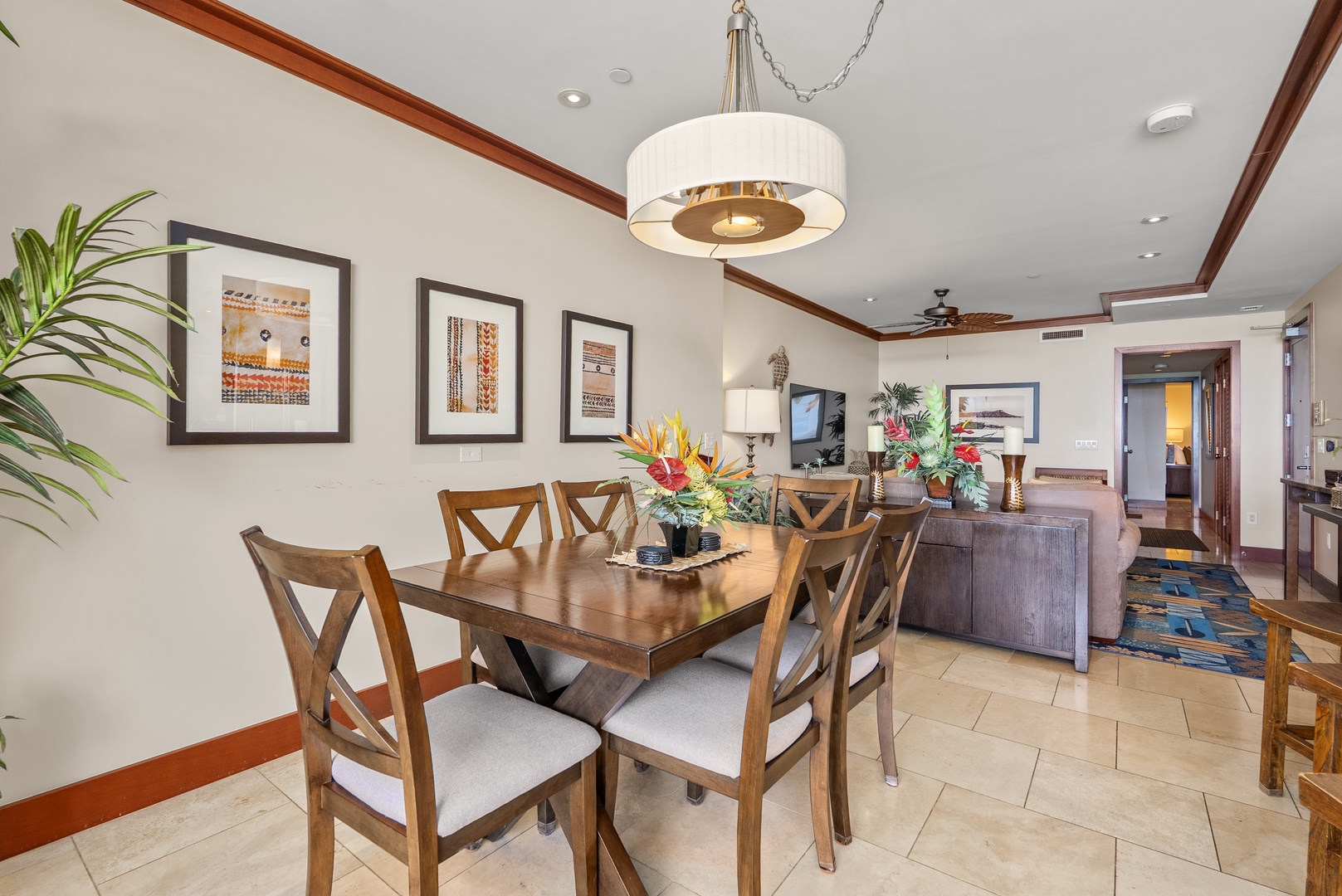 Kapolei Vacation Rentals, Ko Olina Beach Villas O1404 - Open flow from the dining table through to the living room, all one space.