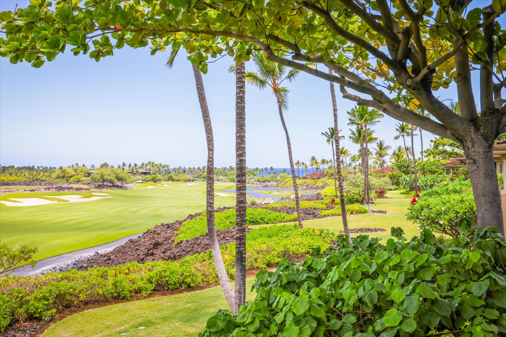 Kailua Kona Vacation Rentals, Wai'ulu Villa 115D - The private lanai has outdoor and ocean views, perfect for your morning coffee or sunset wine.