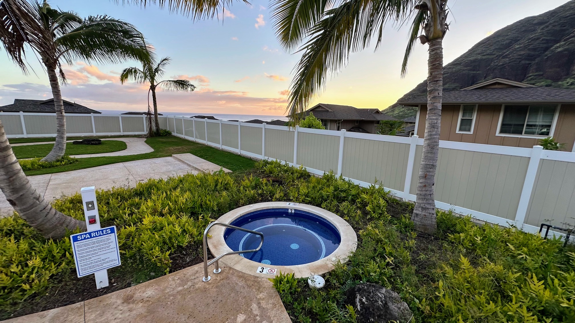 Makaha Valley Vacation Rentals, Makaha Valley Hale Kai** - Hot tub with palm views, the perfect spot to unwind under the sky.