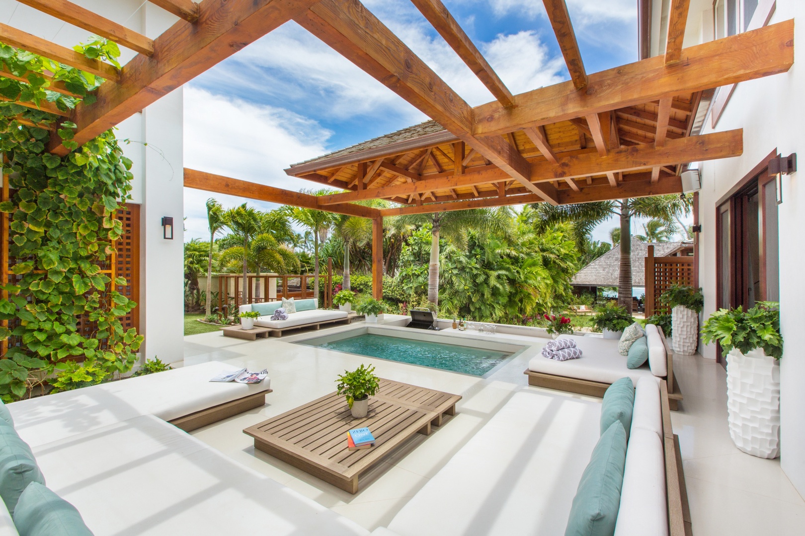 Honolulu Vacation Rentals, Diamond Head Villa* - Open-air poolside lounge with shaded pergola—seamless indoor-outdoor living at its finest.