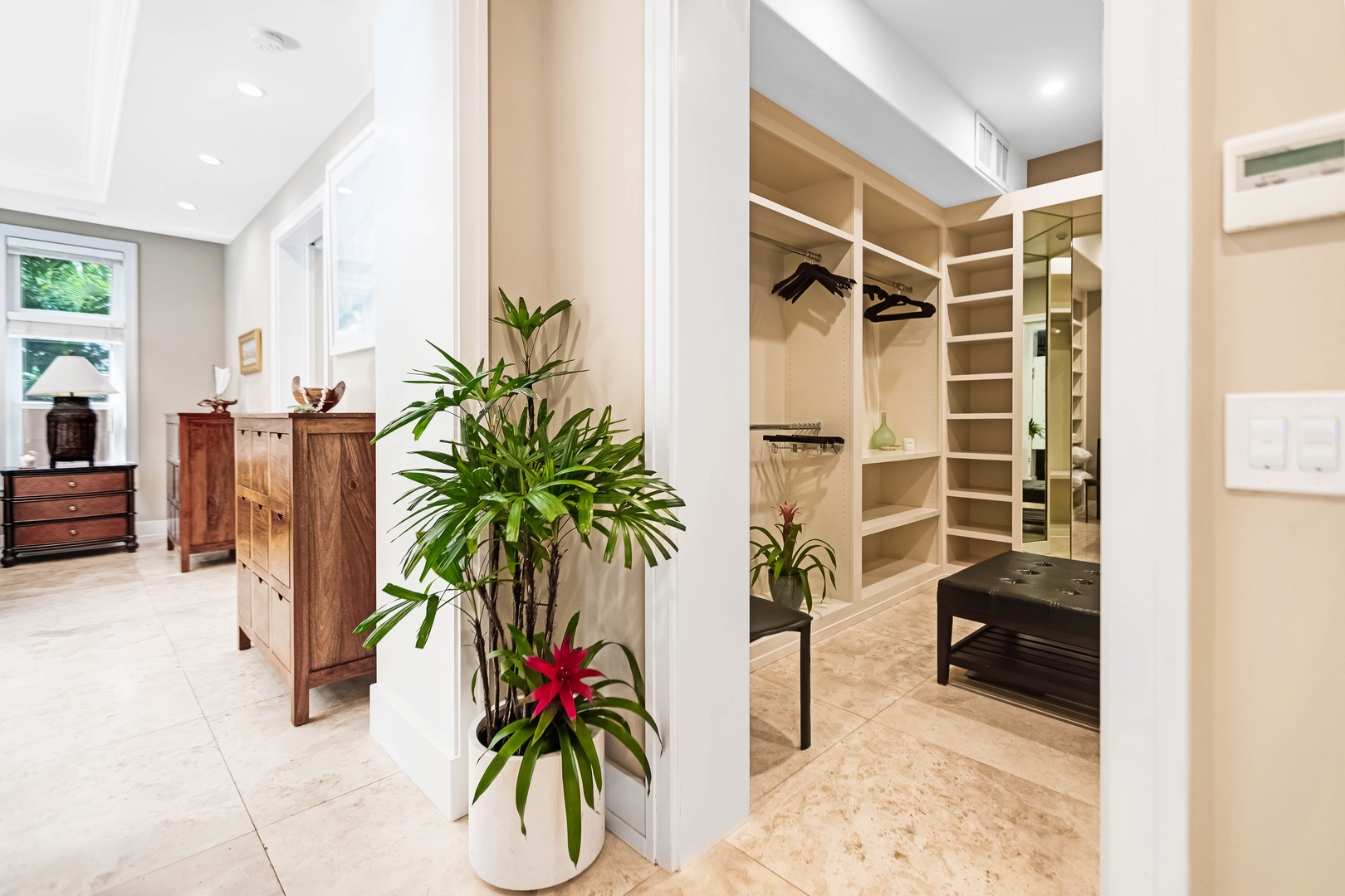 Honolulu Vacation Rentals, Pili Pono - Lush plant accents in the luxe primary closet.