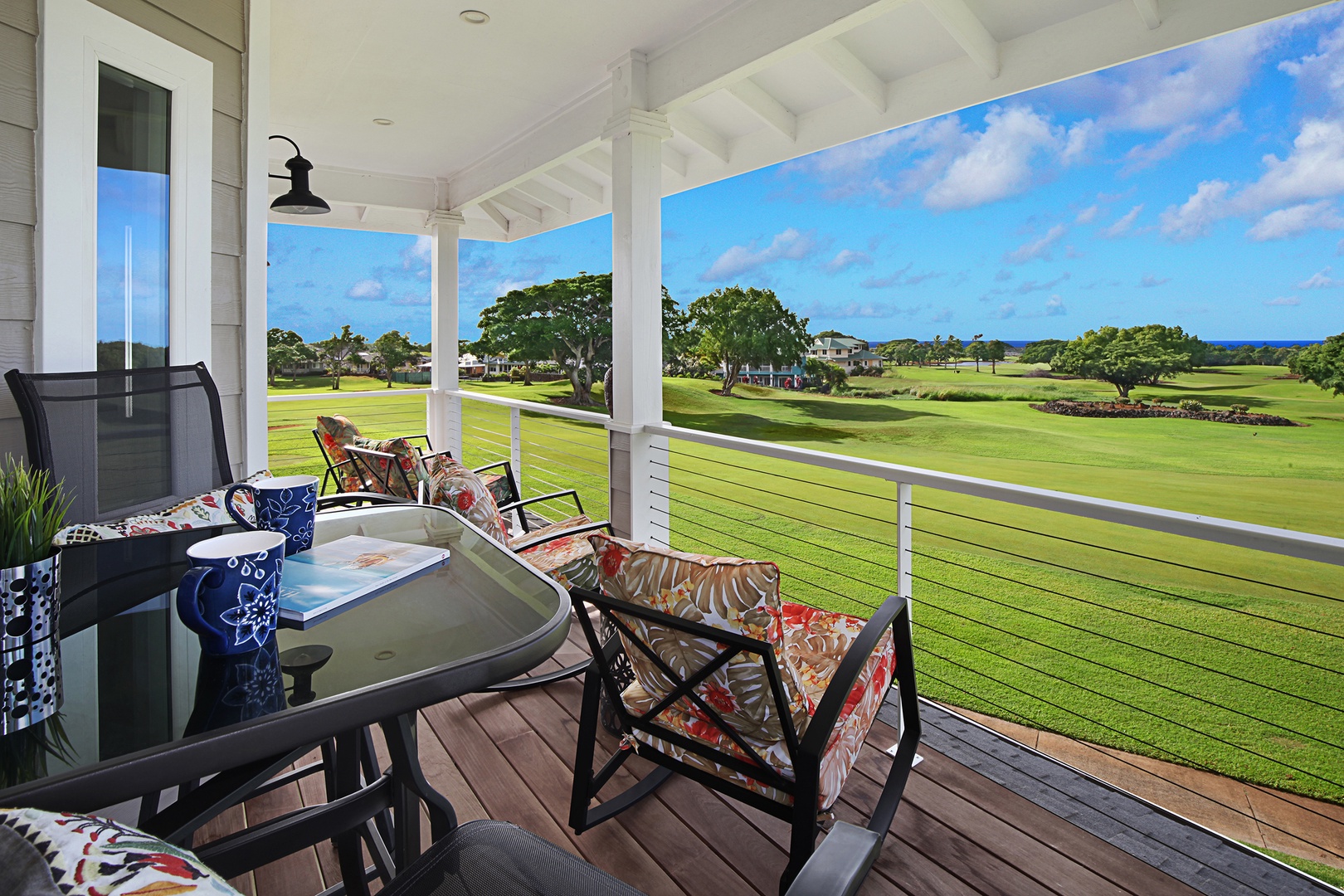 Koloa Vacation Rentals, Haupu Hale at Poipu - Lanai view overlooking vibrant greenery, perfect for enjoying a morning coffee or an evening glass of wine.