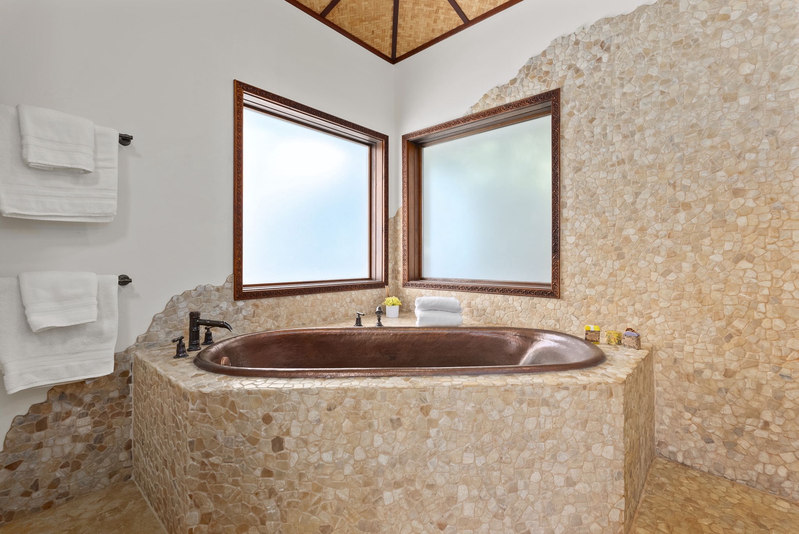 Haleiwa Vacation Rentals, Kealoha Tropical Beach Villa - The ensuite bathroom offers large soaking tub to relax after a day of exploring.