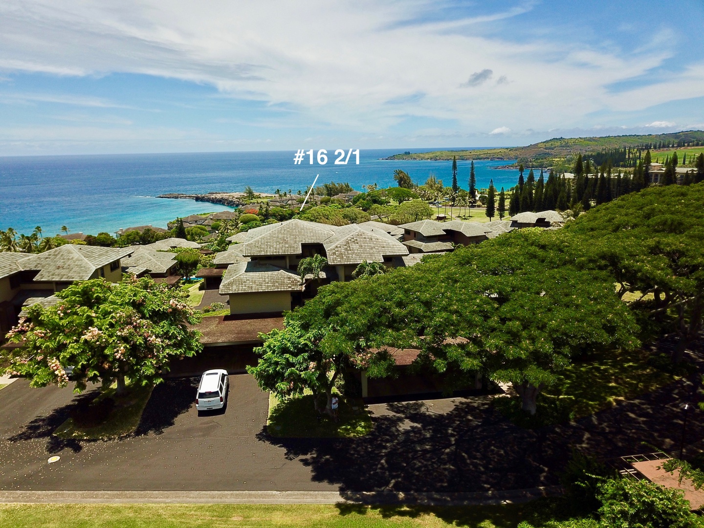 Lahaina Vacation Rentals, Kapalua Ridge 1622 - Nestled within a lush landscape, with expansive ocean views in the distance