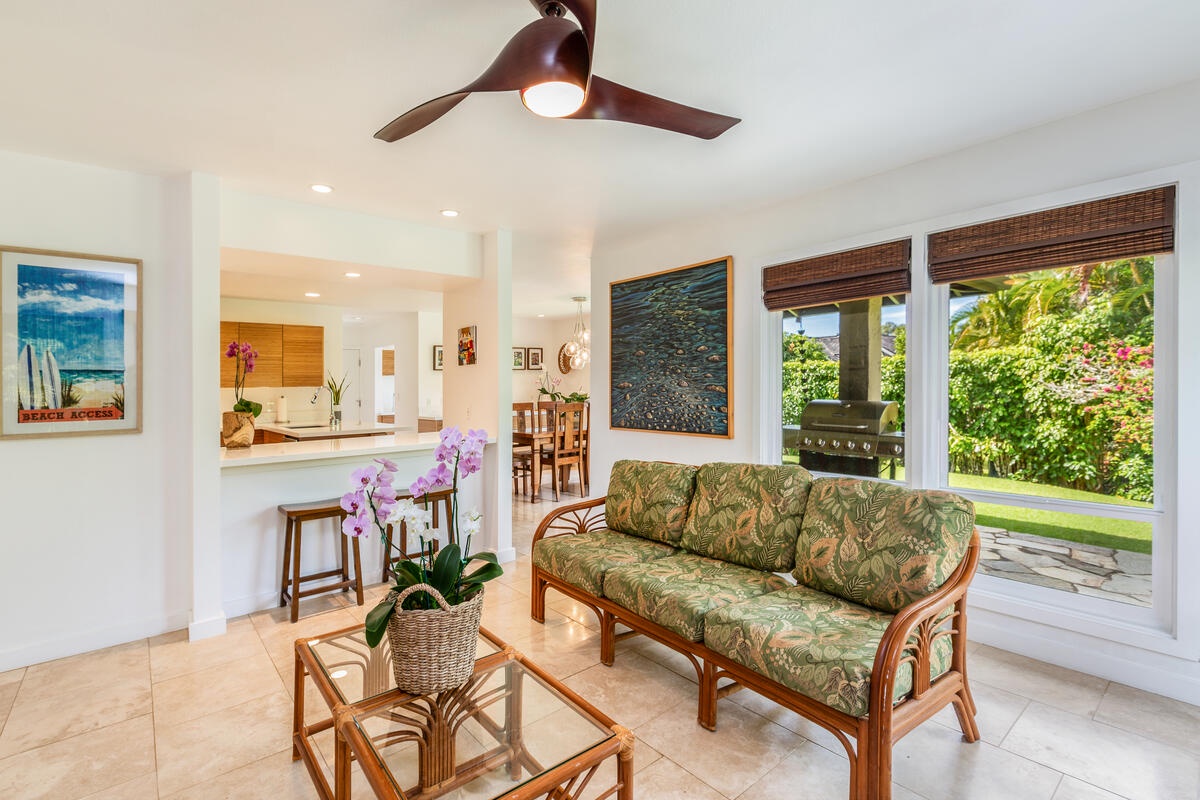Princeville Vacation Rentals, Luana Hale - Cozy living room with a kitchen peek-a-boo