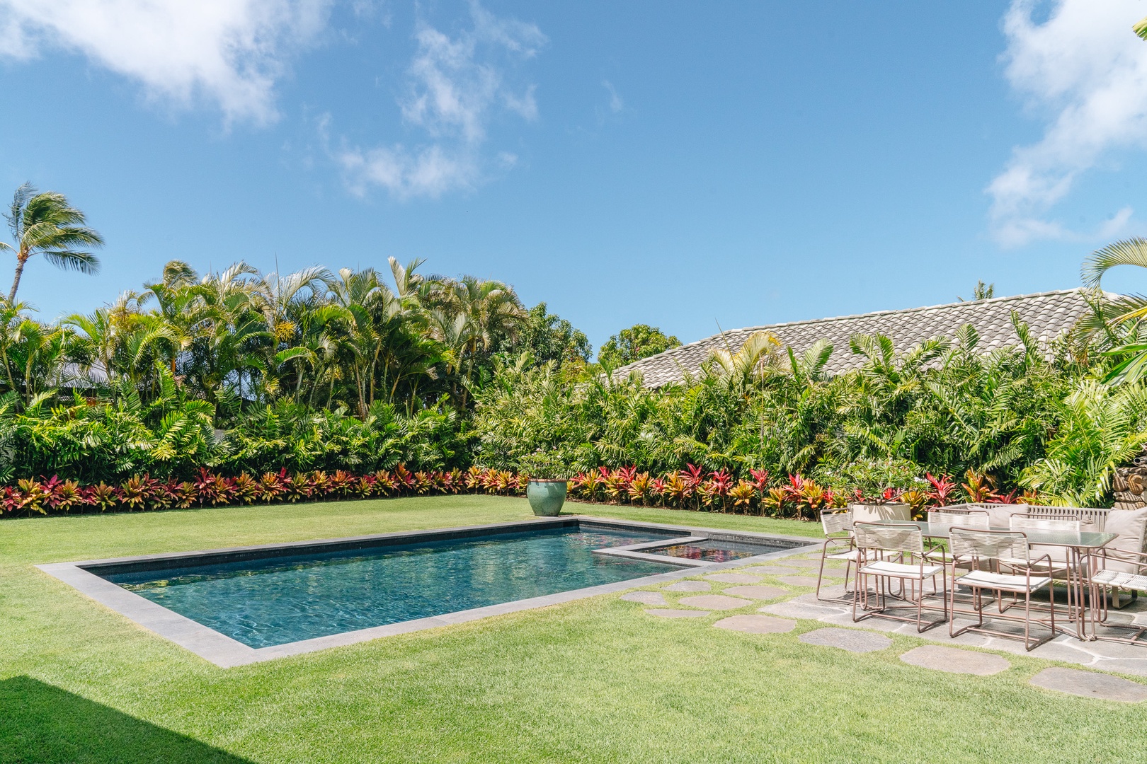 Honolulu Vacation Rentals, Surfside Bungalow** - The private pool is framed by vibrant gardens and open skies, inviting you to slow down and enjoy the moment.