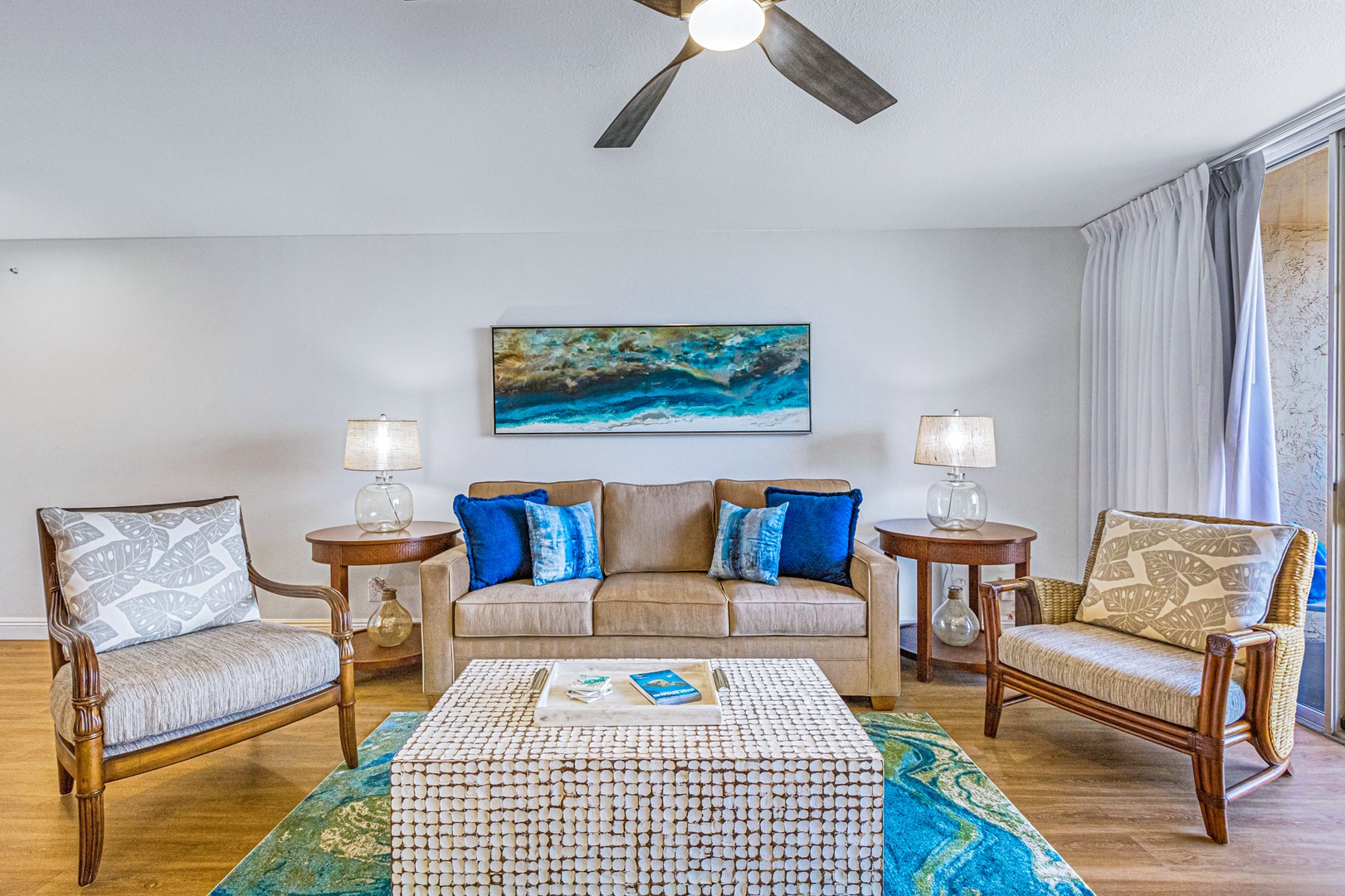 Lahaina Vacation Rentals, Royal Kahana 213 - Comfortable and stylish living room with plush seating and warm lighting, ideal for relaxing or enjoying a quiet evening indoors.