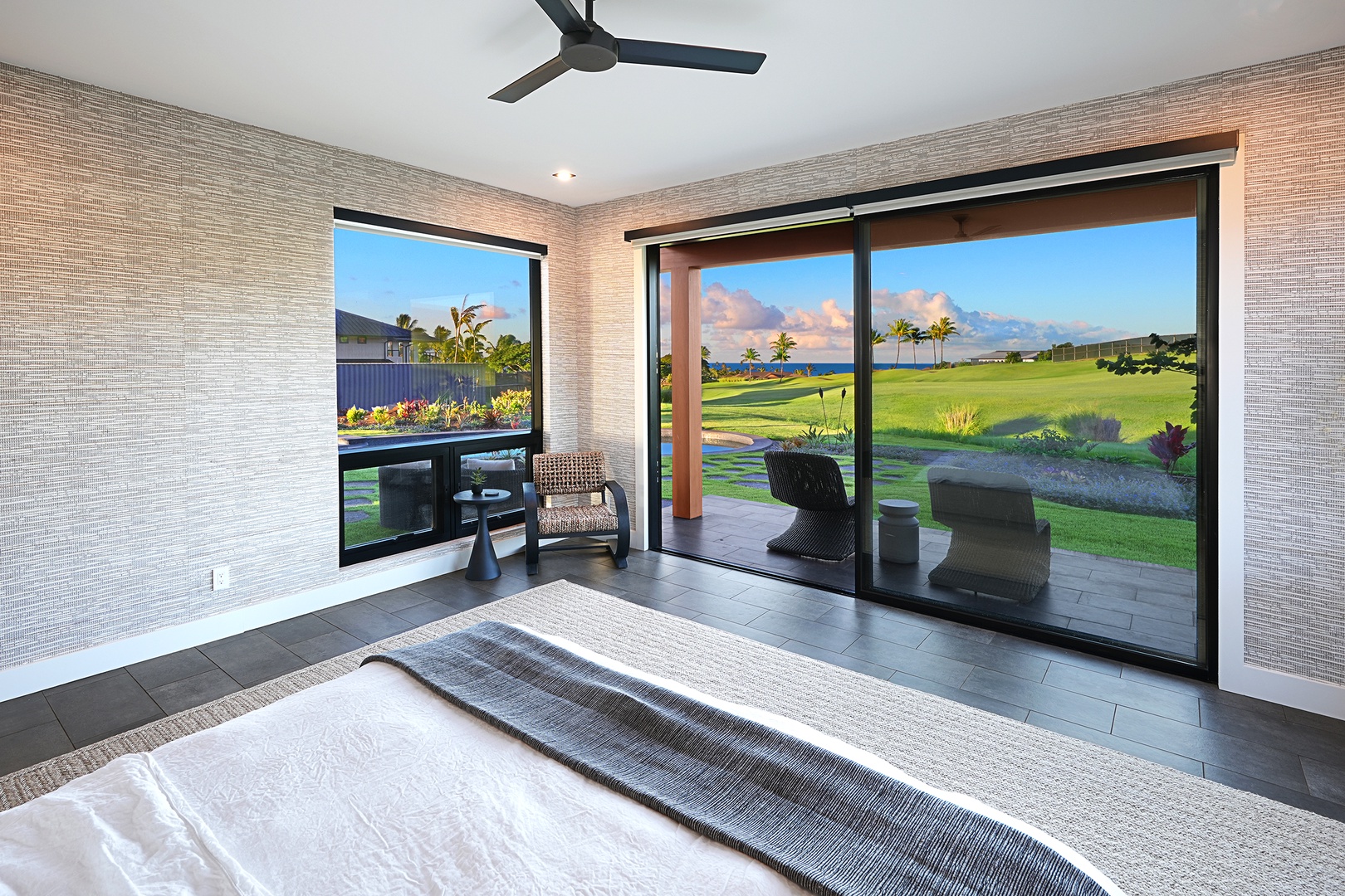 Koloa Vacation Rentals, Hale Hanohano - Guest suite with king bed, floor-to-ceiling windows, and serene views.