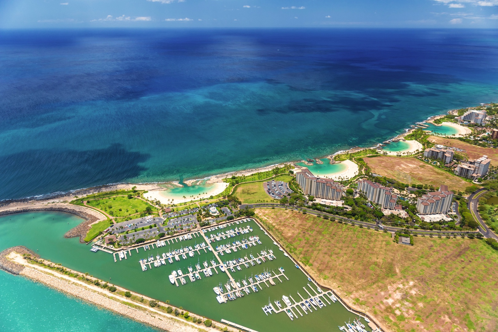 Kapolei Vacation Rentals, Kai Lani 20C - Aerial view of the marina and resort area with stunning ocean views.