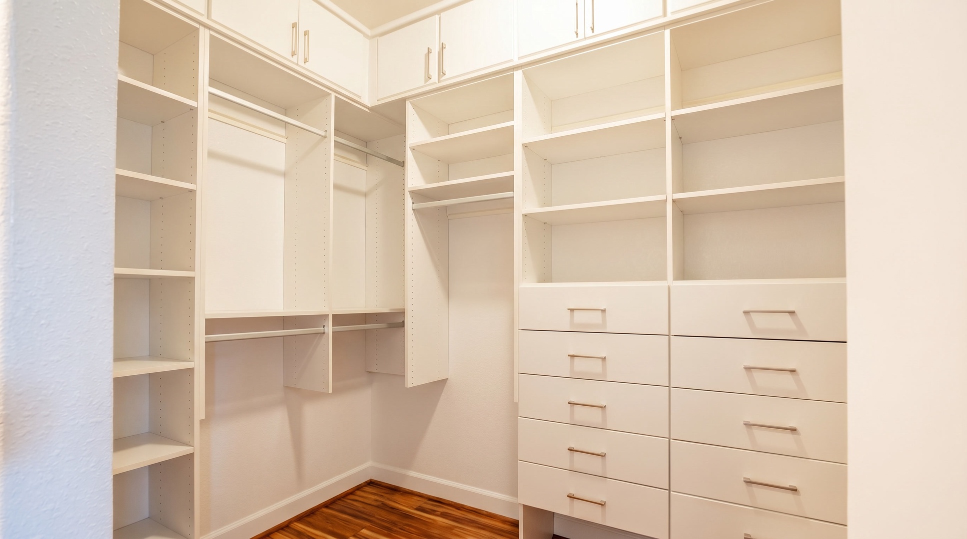 Everything gets put away on day one in a walk-in closet lined with built-in drawers.