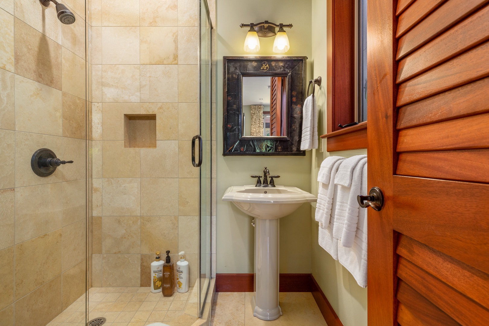 Kamuela Vacation Rentals, Champion Ridge Home - Ensuite bathroom with a single vanity and tropical charm.