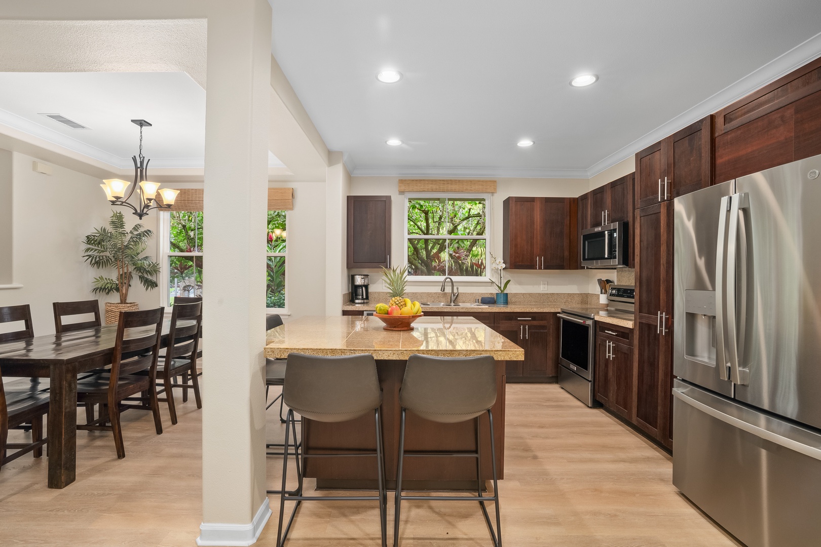 Princeville Vacation Rentals, Hale Kaua'i - Gather in the spacious kitchen with generous prep space and room for shared moments.