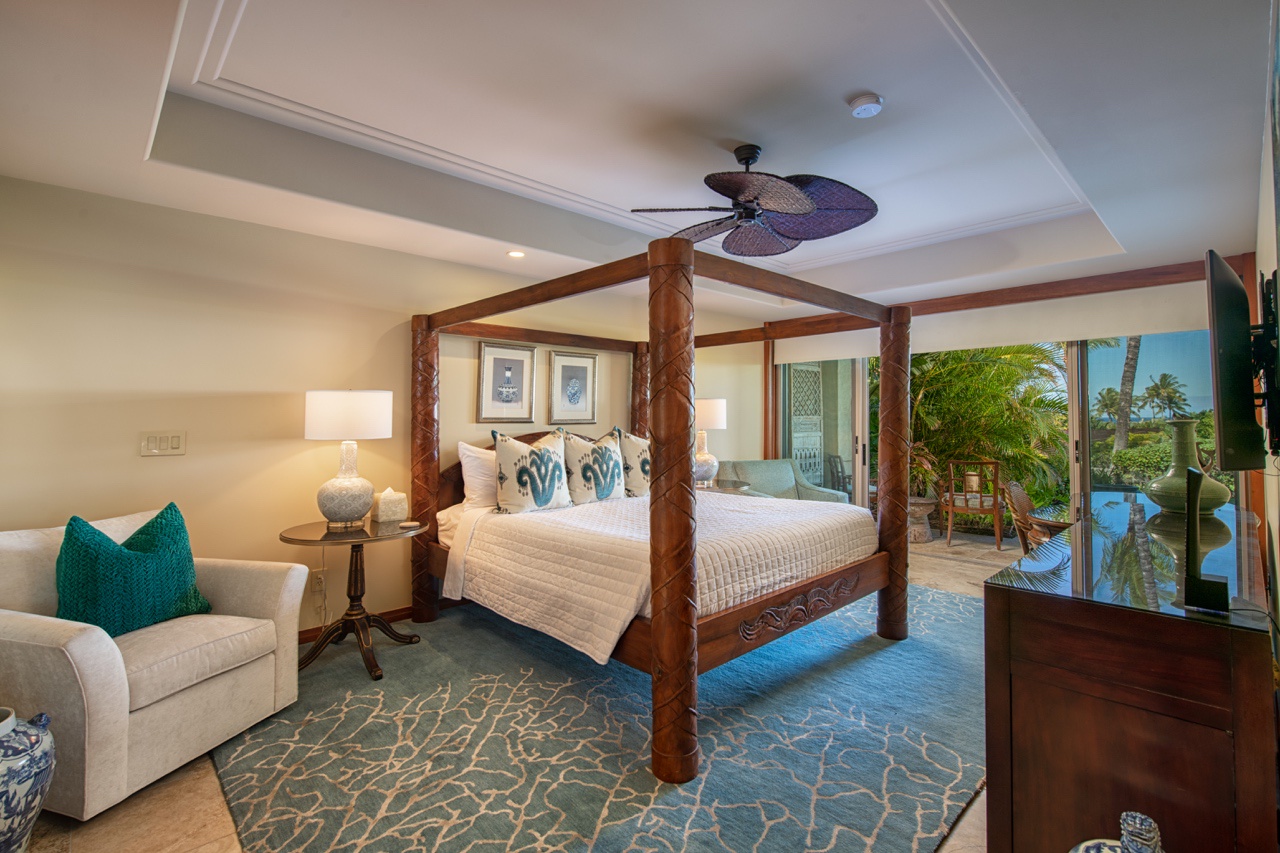 Kailua Kona Vacation Rentals, 2BD Hillside Villa (4102) at Hualalai Resort - The primary suite is a serene retreat, featuring a luxurious king-size bed, large windows with ocean views, and direct access to the lanai.