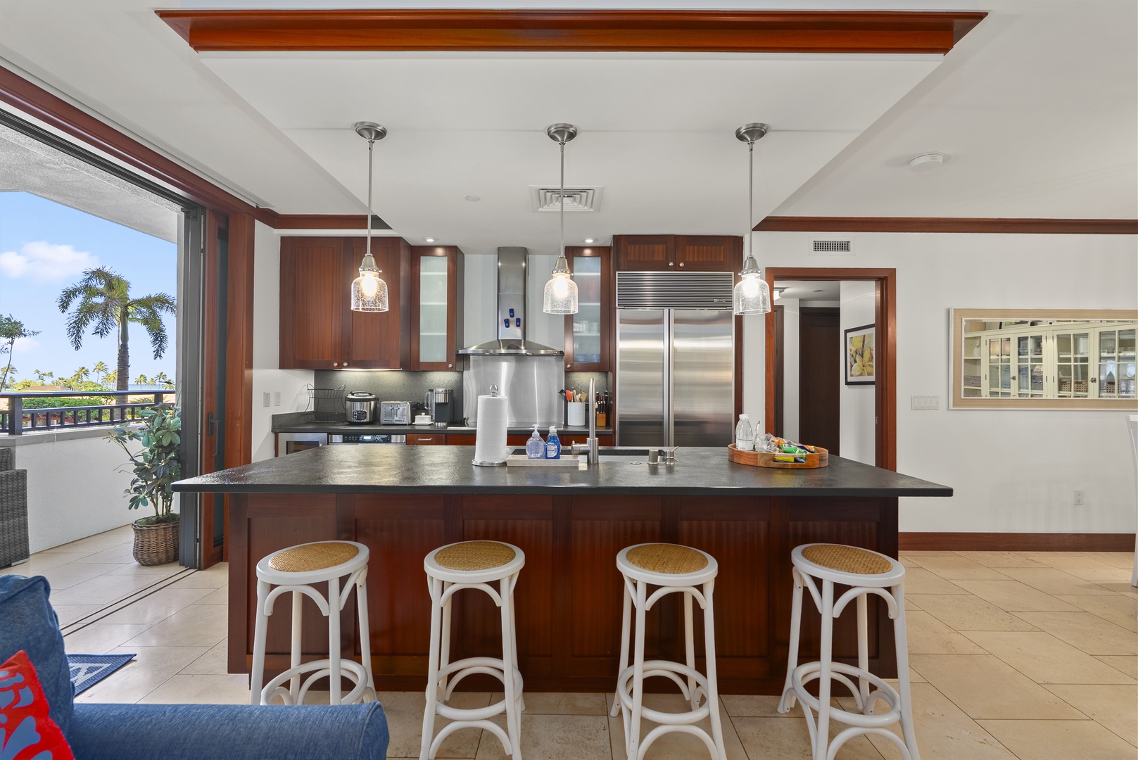 Kapolei Vacation Rentals, Ko Olina Beach Villas O211 - Light fills the kitchen through the tall windows, the island long enough for a whole meal's prep.
