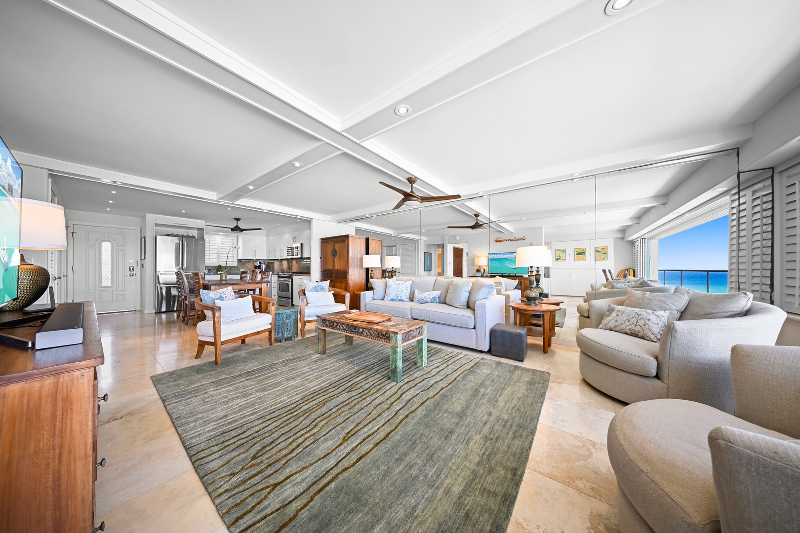 Honolulu Vacation Rentals, Kaimana Shores Getaway - Enjoy the bright, open-concept design that brings together the living, dining, and kitchen areas for effortless island living.