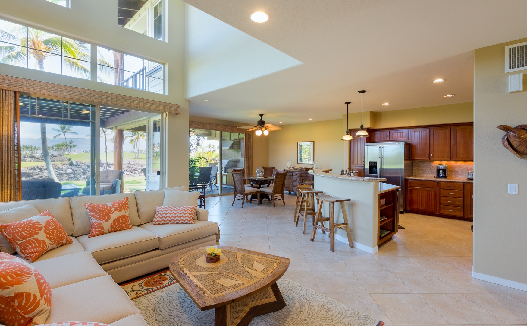 Kamuela Vacation Rentals, Mauna Lani Golf Villas C1 - Villa C1's open-concept floor plan allows for flow between the well-equipped kitchen and the inviting living and dining spaces, making it possible for the whole group to gather for quality time together.