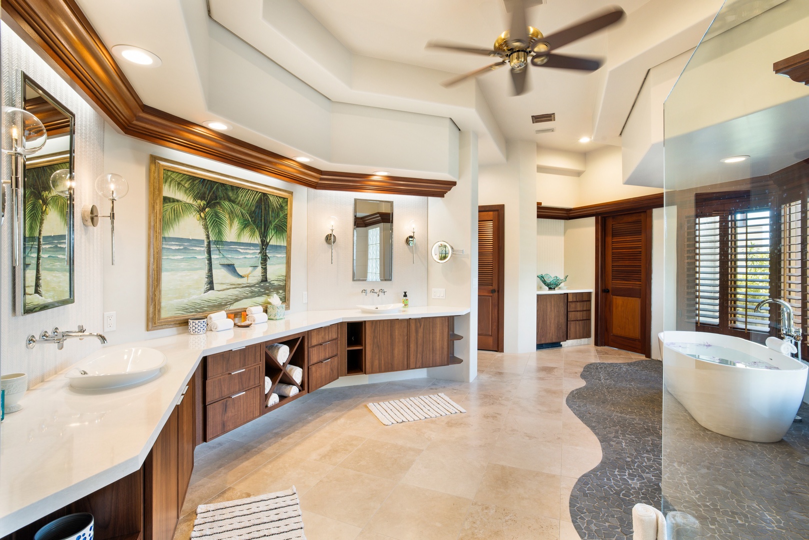 Kamuela Vacation Rentals, Champion Ridge 7 - Dual vanities, natural stone finishes, and direct lanai access make this ensuite feel like a personal retreat.