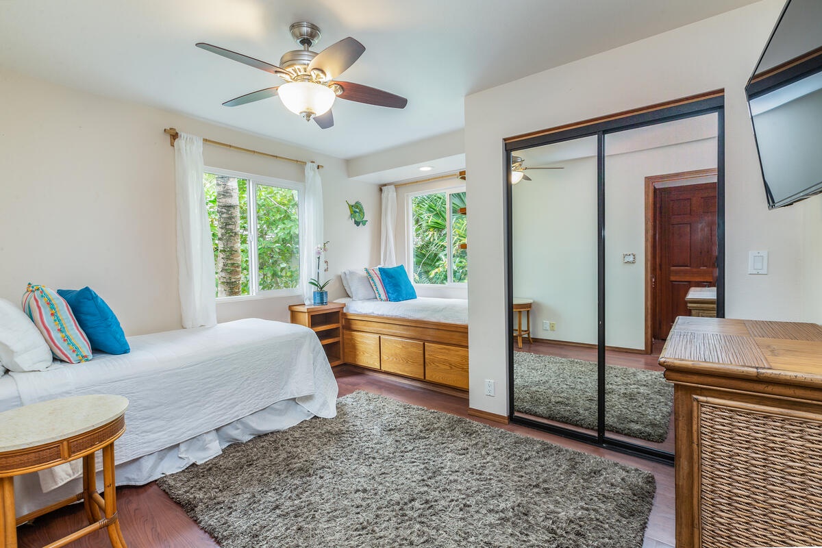 Princeville Vacation Rentals, Hale Ohia - Guest Bedroom 5 is perfect for the kids with 2 twin beds, garden views, and a ceiling fan