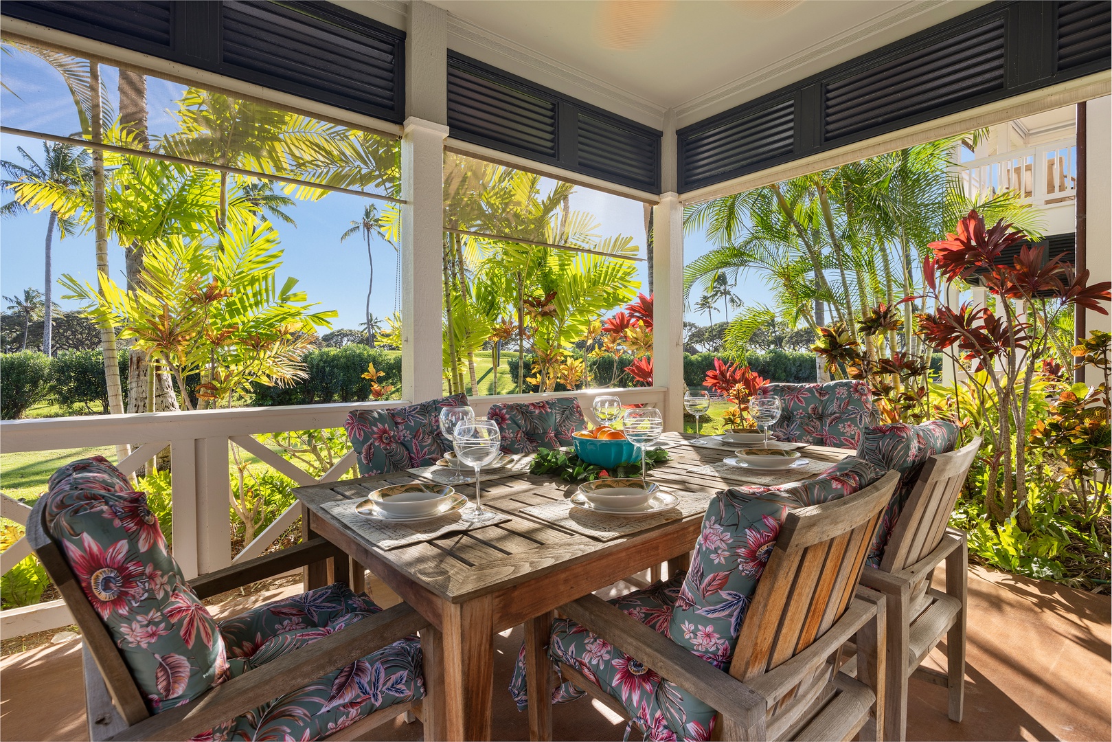 Savor tropical dining surrounded by lush palms and vibrant foliage on your private covered terrace, where every meal feels like paradise.