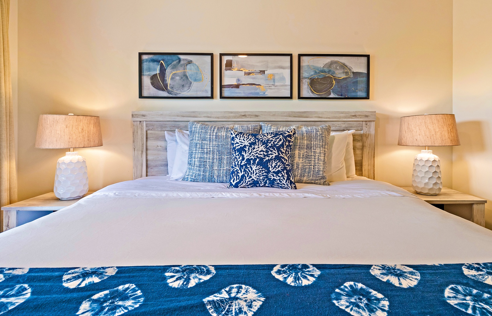 Lahaina Vacation Rentals, Honua Kai Konea 206 - The bedroom features a cozy king bed adorned with soft linens and stylish decor, offering a peaceful and inviting atmosphere for a restful night's sleep.