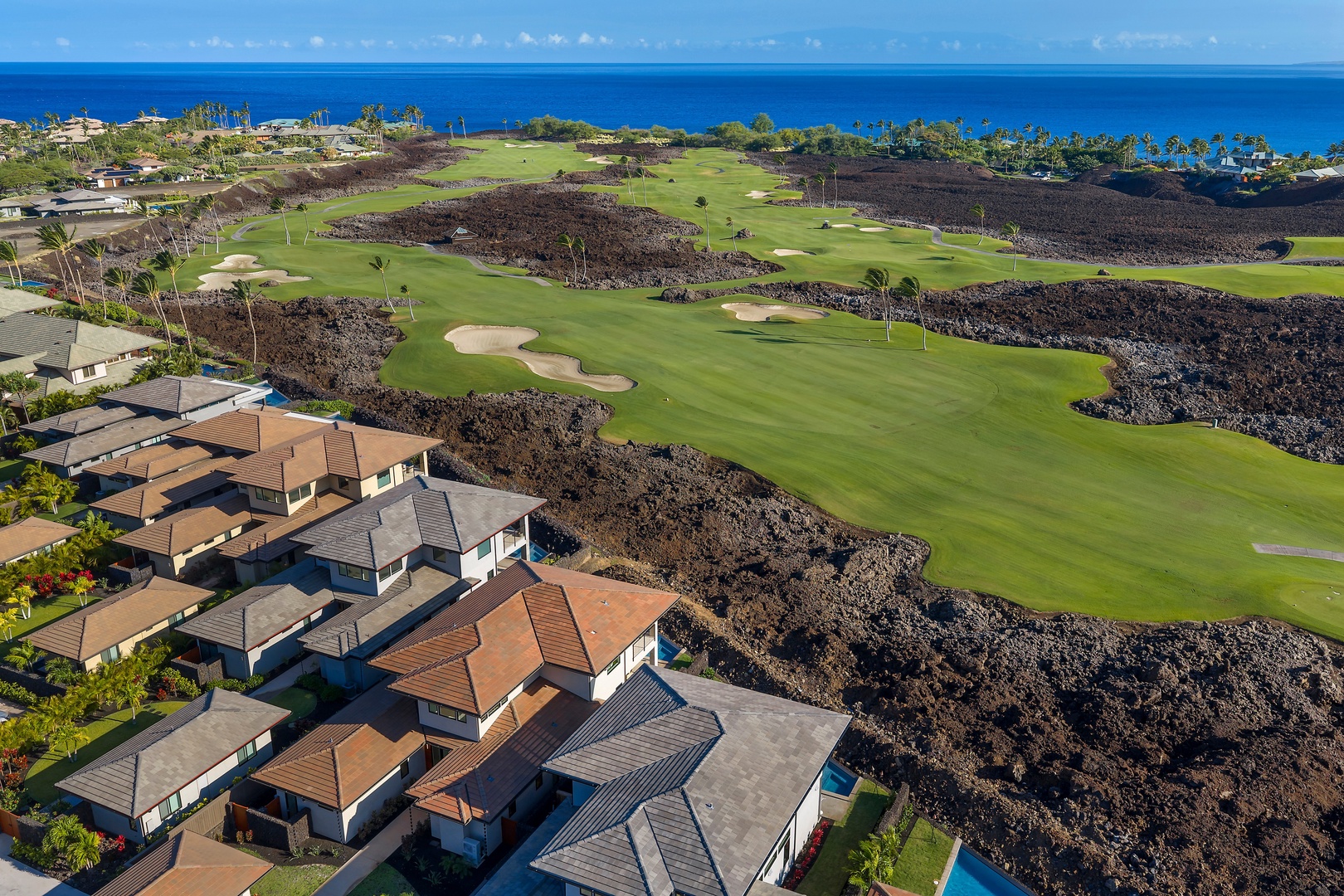 Kamuela Vacation Rentals, 6BD Mauna Lani Lux Golf Estate (6) at One Ocean - Seen from the air, the lava fields give way to green fairways and the open Pacific beyond.