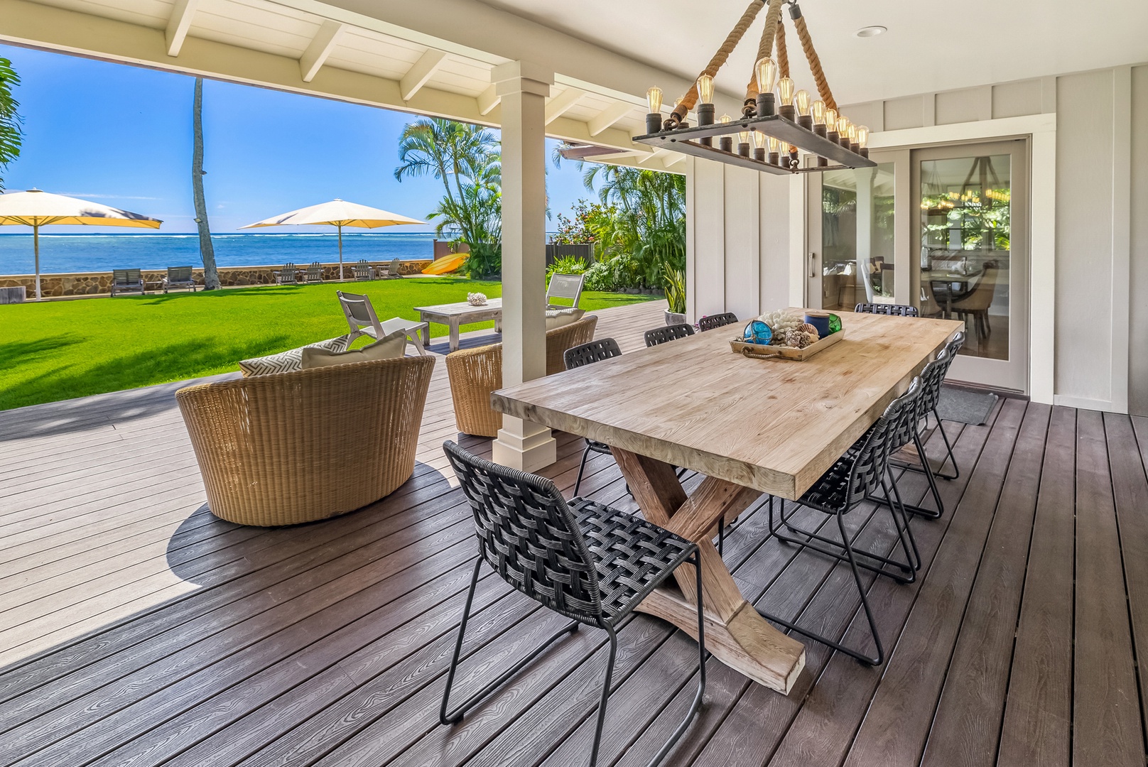 Honolulu Vacation Rentals, Moana Lani - Gather for meals on the covered lanai, with ocean breezes and views.