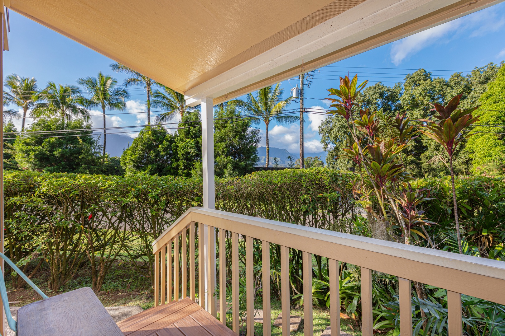 Princeville Vacation Rentals, Pohaku Kauai - Covered lanai with views of lush foliage and mountain peaks—ideal for slow mornings and sunset unwinding.
