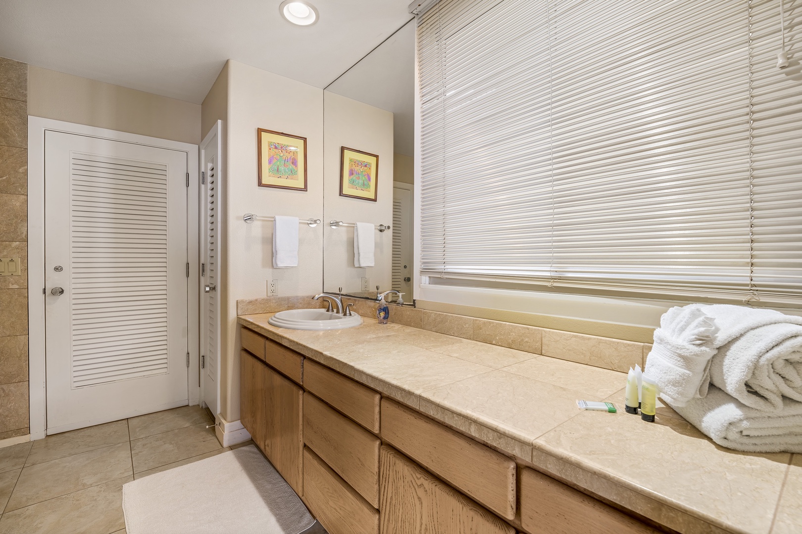 Kailua Kona Vacation Rentals, Ali'i Point #12 - Convenient ensuite bathroom attached to the guest bedroom—comfort and privacy combined.