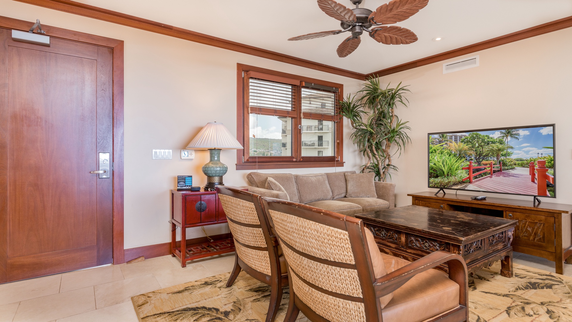 Kapolei Vacation Rentals, Ko Olina Beach Villas B701 - Enjoy movie night in the living area with the TV and tastefully appointed decor.