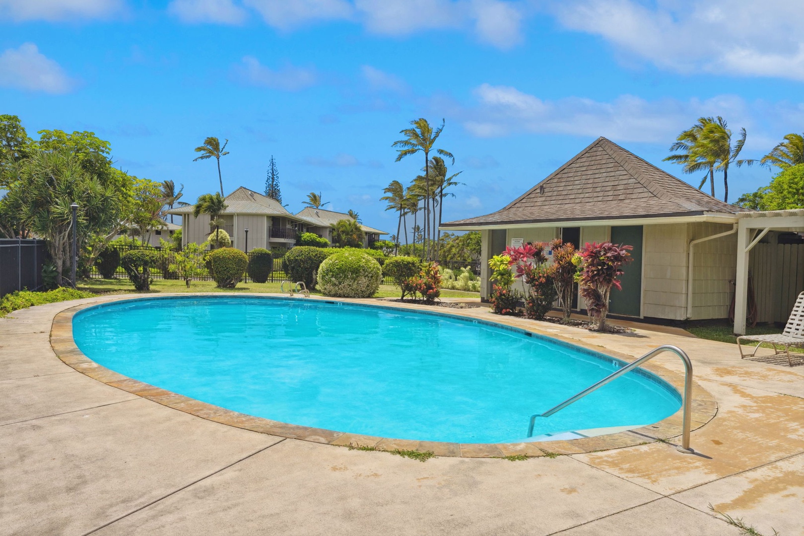 Princeville Vacation Rentals, Alii Kai 7201 - Slip into the community pool ringed by palms whenever the mood strikes.
