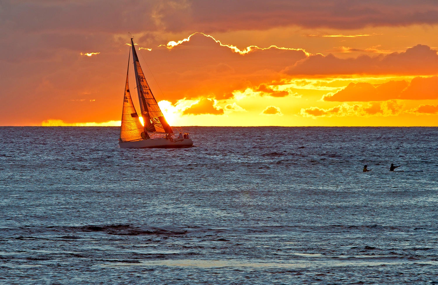 Honolulu Vacation Rentals, Executive Gold Coast Oceanfront Suite - Exceptional sunsets from the living room.