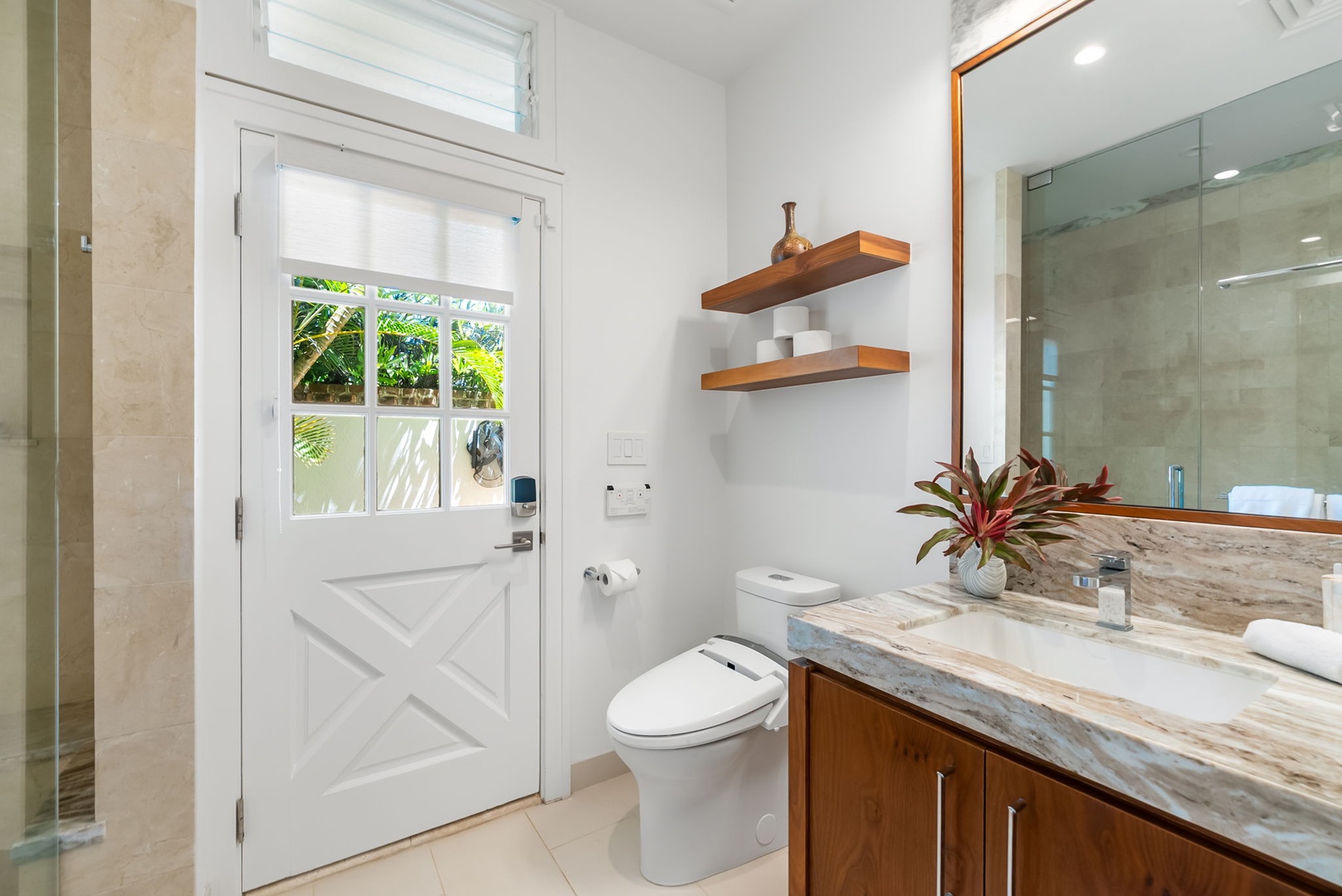 Kailua Vacation Rentals, Lanikai Sunrise Estate - Conveniently located main level bath with tropical accents and direct back yard access—perfect for beach days or guests.