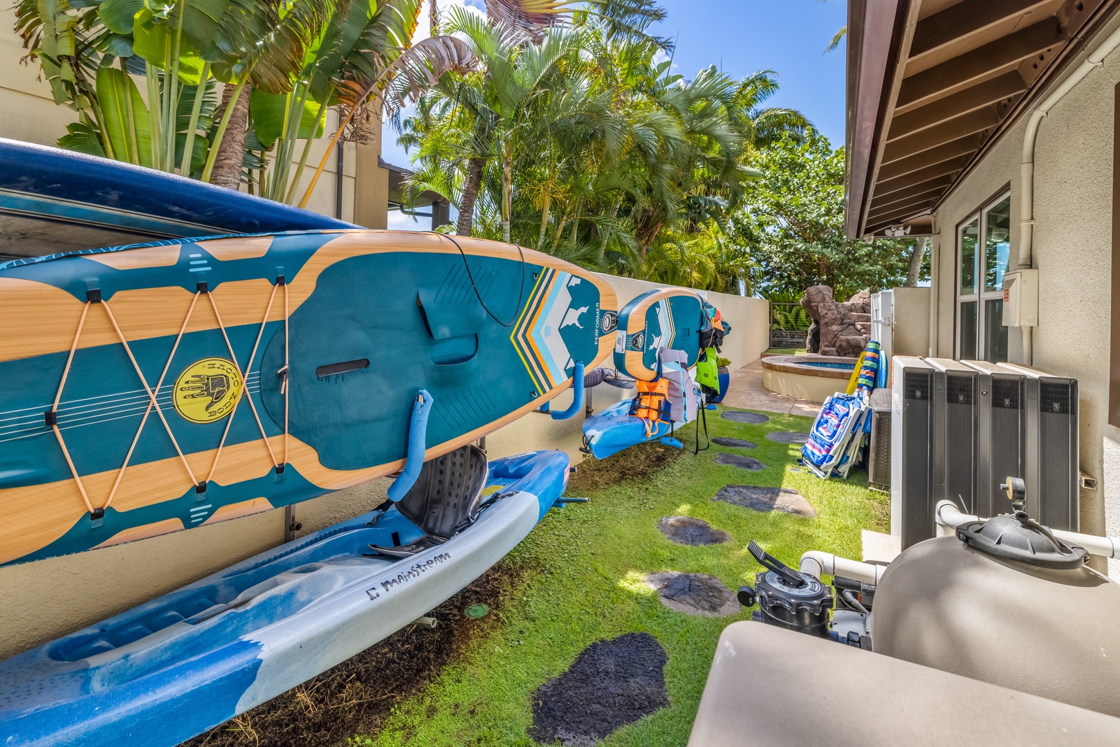 Honolulu Vacation Rentals, Nanea Kai Villa - Ready for adventure! Paddleboards and gear available for your beachfront activities.