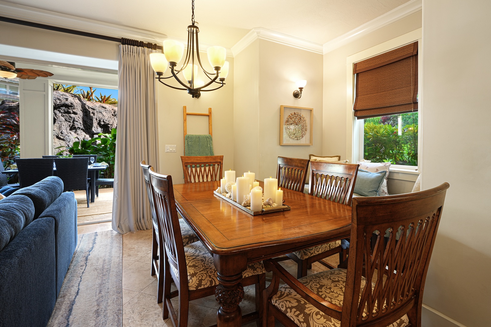 Koloa Vacation Rentals, Villas at Poipu Kai B111 - A fully appointed kitchen with fine finishes offers bar seating, with a more formal dining area nearby.