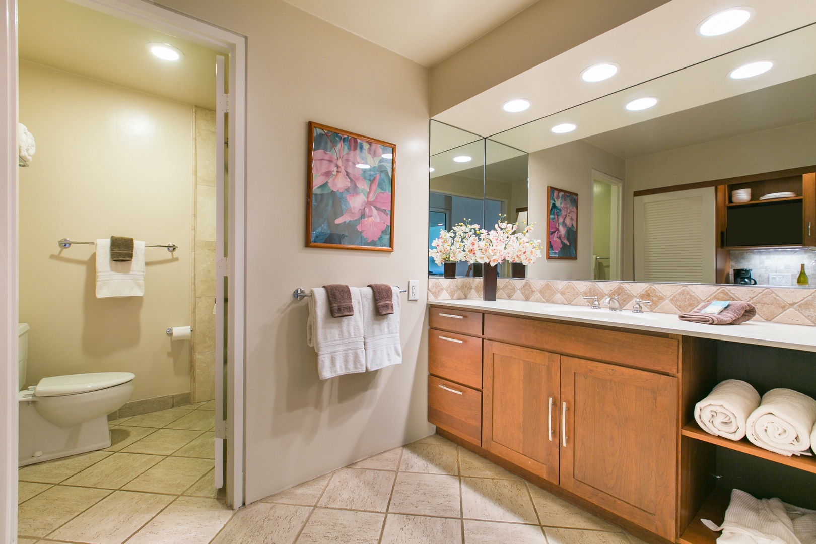 Princeville Vacation Rentals, Hanalei Bay Resort 4302/3 - The ensuite bathroom features a vanity and a spacious walk-in shower.