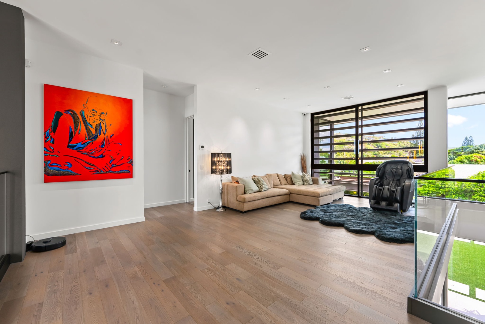 Honolulu Vacation Rentals, Ocean Villa 3 Bedroom - Relaxed living space with modern furnishings, bold artwork, and garden views.