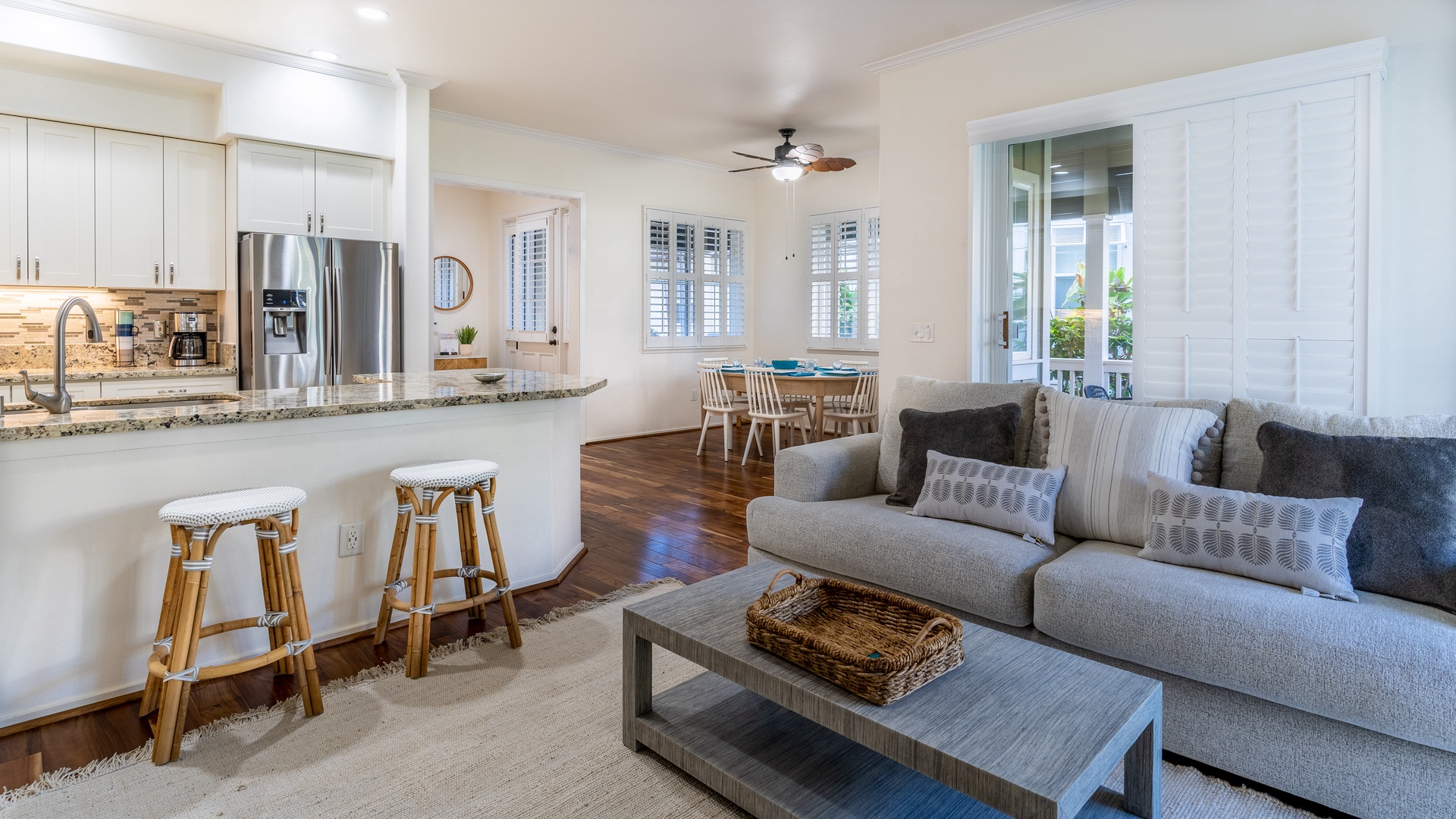 Kapolei Vacation Rentals, Coconut Plantation 1158-1 - Sink into the plush seating in the living area surrounded by natural wood tones.