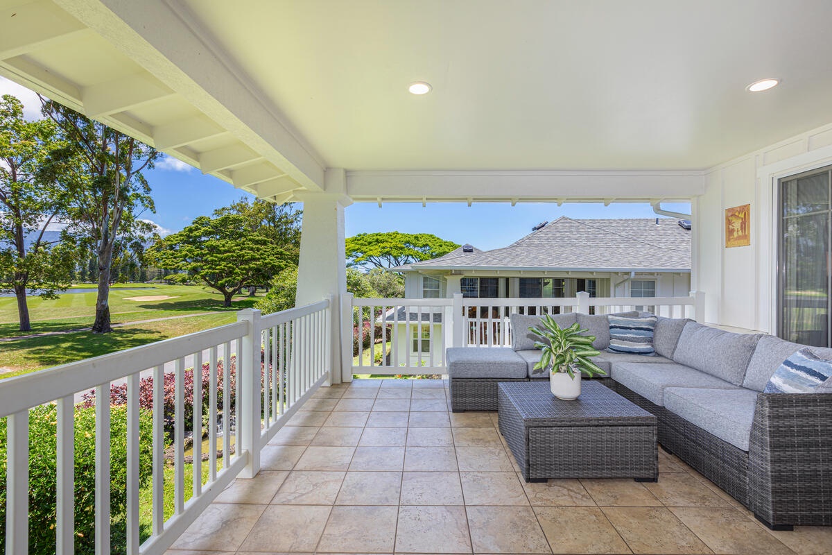 Princeville Vacation Rentals, Pili Aloha - Relaxing outdoor lanai with comfortable seating and serene views.
