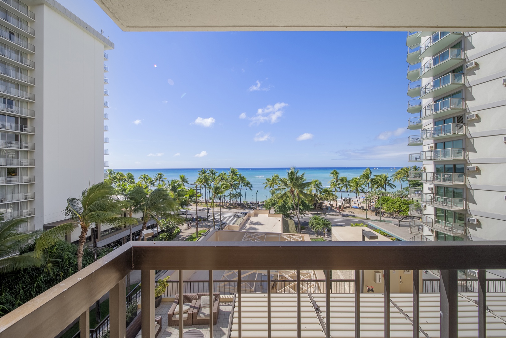 Honolulu Vacation Rentals, Aston Waikiki Beach Tower 602 - Let the sights and sounds of the Pacific Ocean surround you on your private balcony.