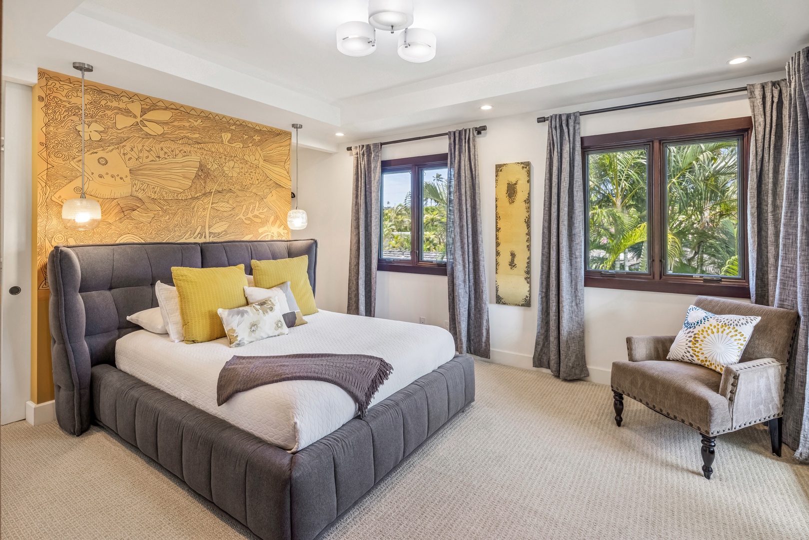 Honolulu Vacation Rentals, Kahala Grand Splendor - The upstairs guest bedroom features a queen bed, warm decor, and plenty of natural light.