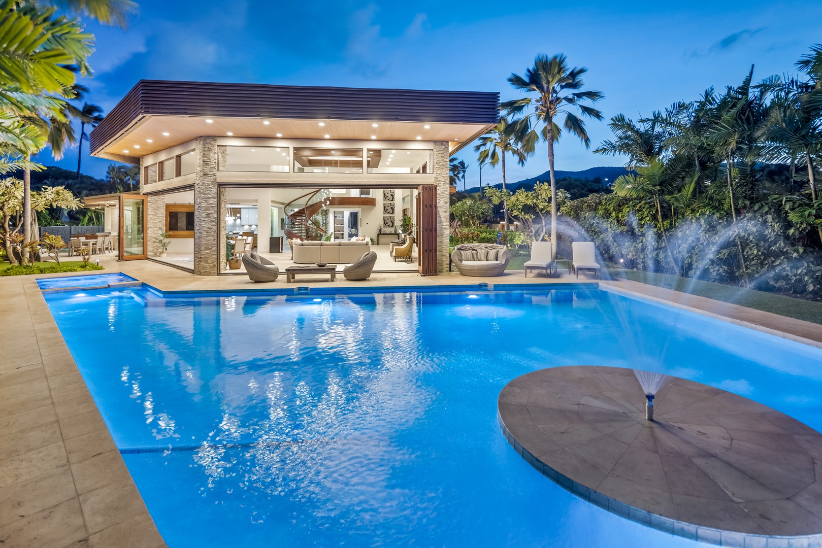 Honolulu Vacation Rentals, Kahala Grand Splendor - Twilight views from the pool create the perfect setting to unwind after a day of adventure.