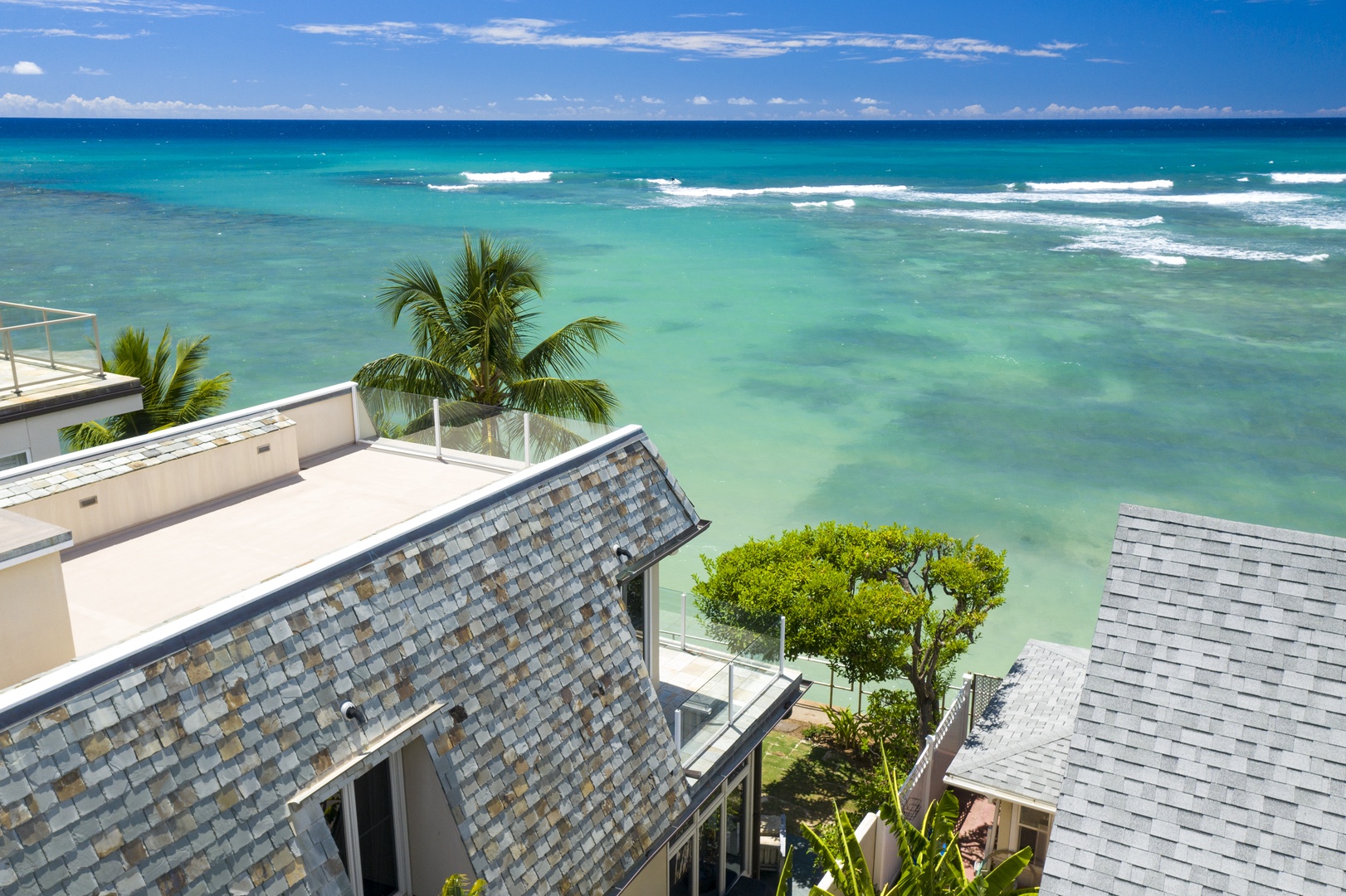 Honolulu Vacation Rentals, Diamond Head Surf House - Aerial View of the oceanfront home.