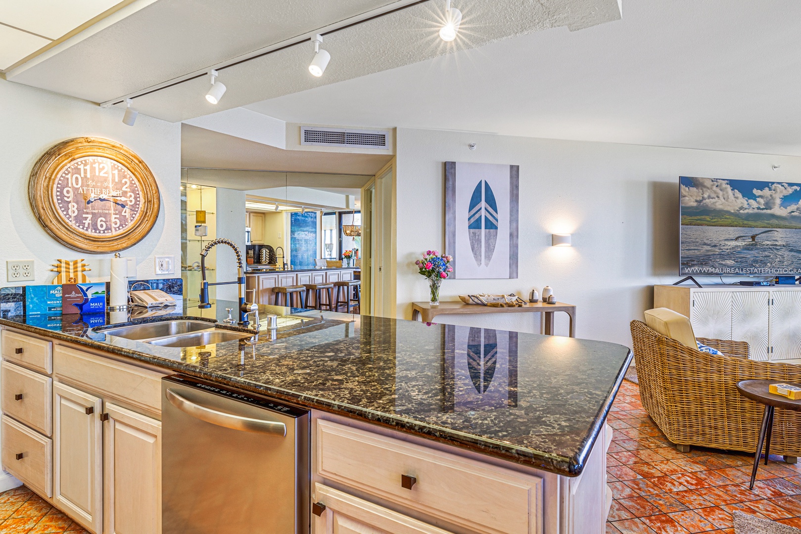 Lahaina Vacation Rentals, Kaanapali Shores 502 - A spacious granite-topped kitchen island provides extra room for meal prep or casual dining, enhancing the open-concept layout.