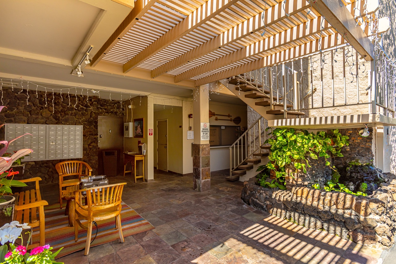Kihei Vacation Rentals, Kamaole Beach Royal 610 - A small lava-rock water feature greets you in the lobby on the way up.