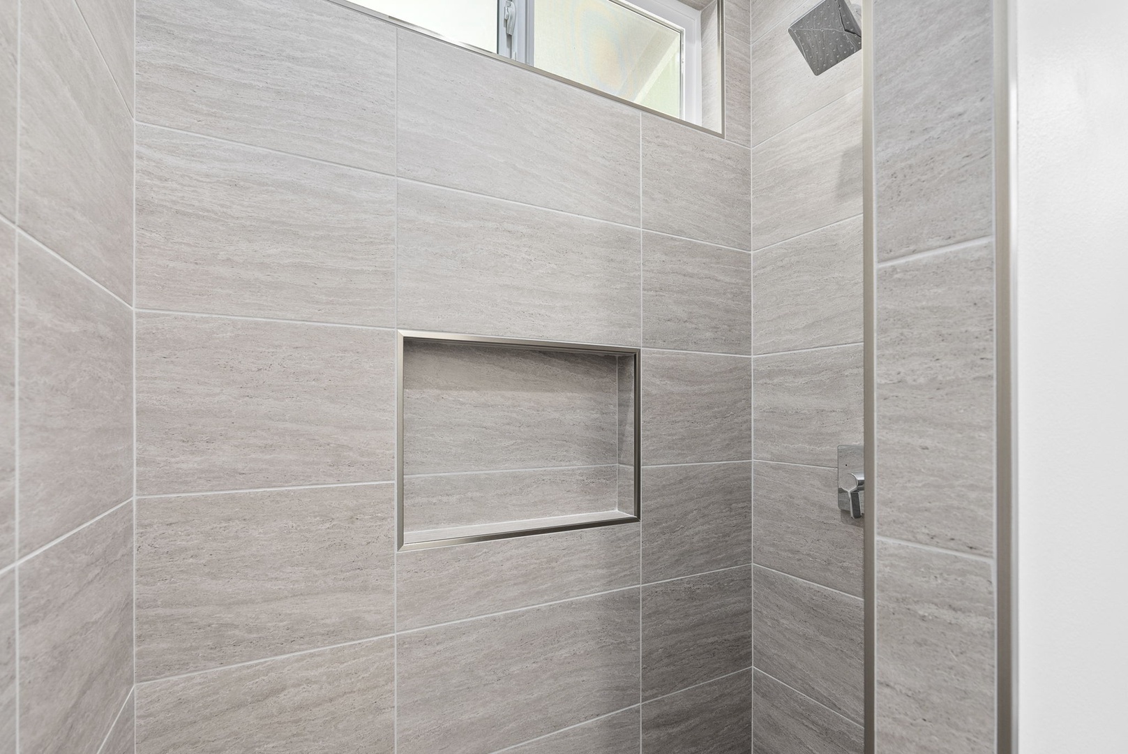 Waianae Vacation Rentals, Oceanfront Luxury Dream Estate - Walk-in shower with tile surround and built-in niche—designed with spa-like simplicity.