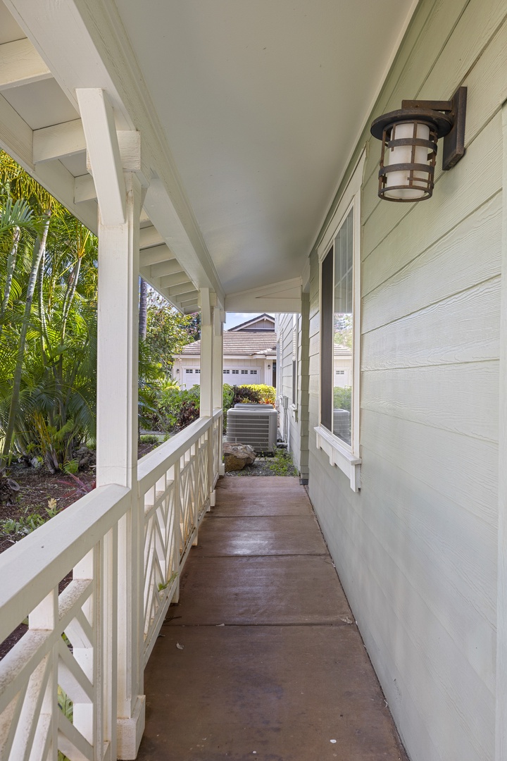 Tropical landscaping and covered walkways create a pleasant path to and from your island retreat.
