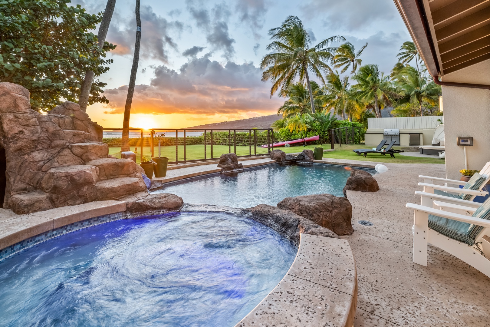 Honolulu Vacation Rentals, Nanea Kai Villa - Enjoy a refreshing drink by the pool and witness the breathtaking sunset views.