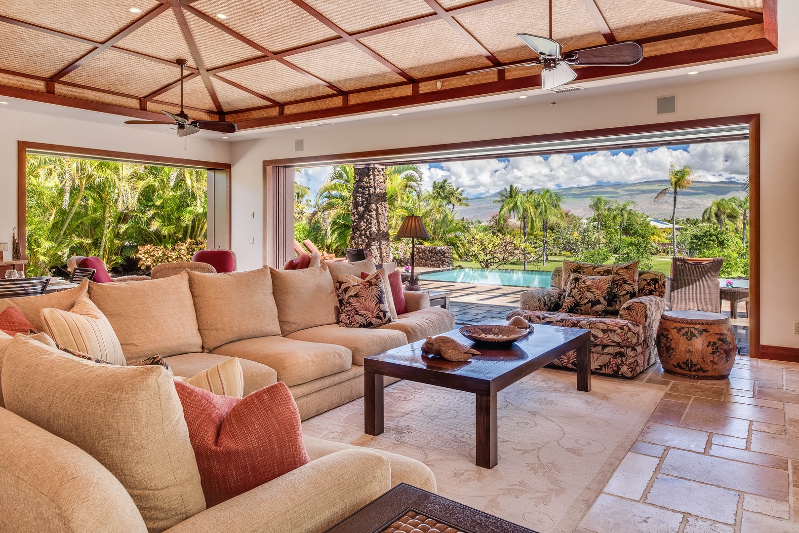 Kamuela Vacation Rentals, House of the Turtle at Champion Ridge, Mauna Lani (CR 18) - The bright and airy open living area features a plush sectional sofa.