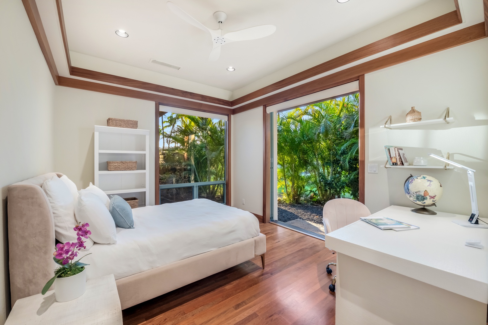 Kamuela Vacation Rentals, Champion Ridge Elegance - Guest Suite 3 with a double bed and refined decor and additional shelving.