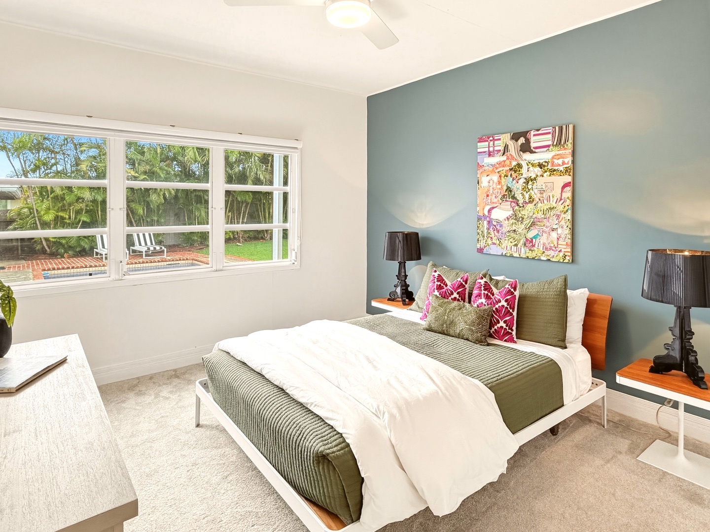 Honolulu Vacation Rentals, Ho'okipa Villa - Your bright bedroom features garden views, stylish decor, and crisp linens for perfect relaxation.